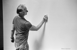 Roy Lichtenstein drawing on canvas in his studio, ca. 1991. © Bob Adelman